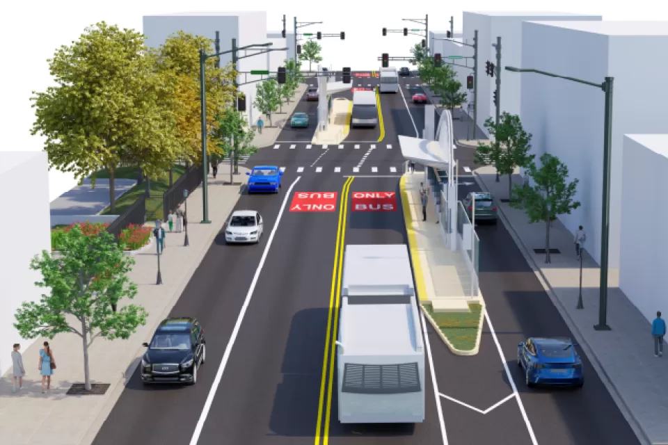 A conceptual rendering of a bus stop and bus-only lane on a downtown street.